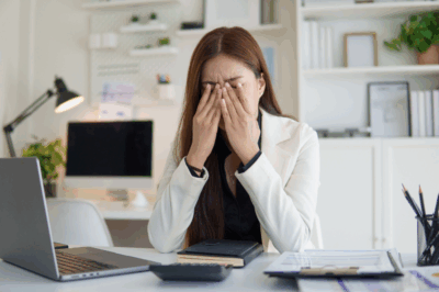 Woman with chronic fatigue, tired at work